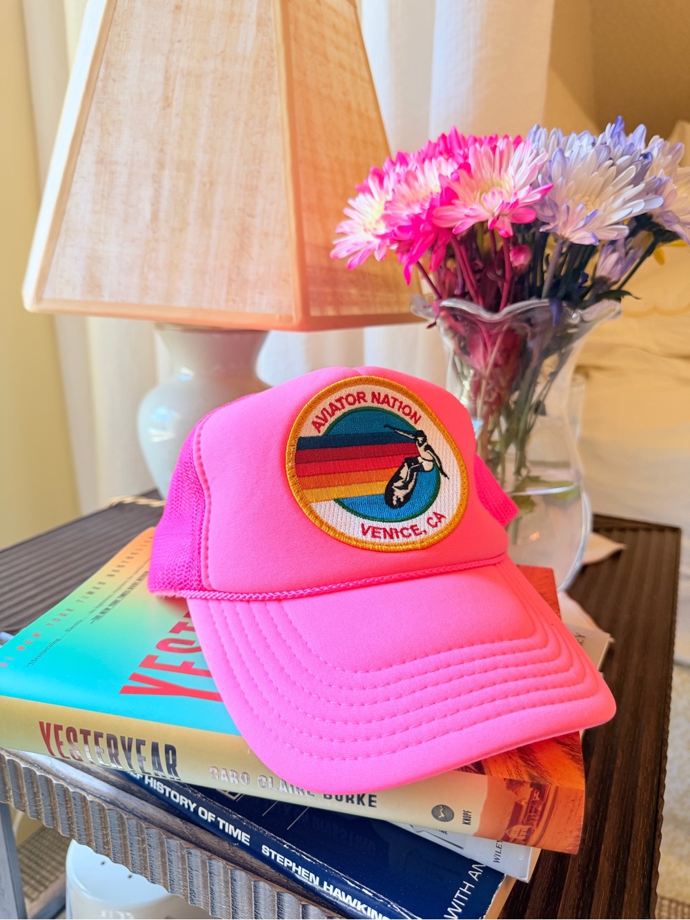 Women’s AVIATOR NATION VENICE TRUCKER HAT in neon pink.